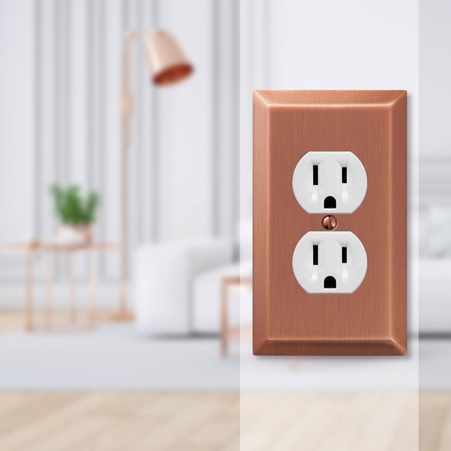 Left. AMERELLE - Amerelle Century Antique Copper 1 gang Stamped Steel Duplex Wall Plate 1 pk - Cooper.