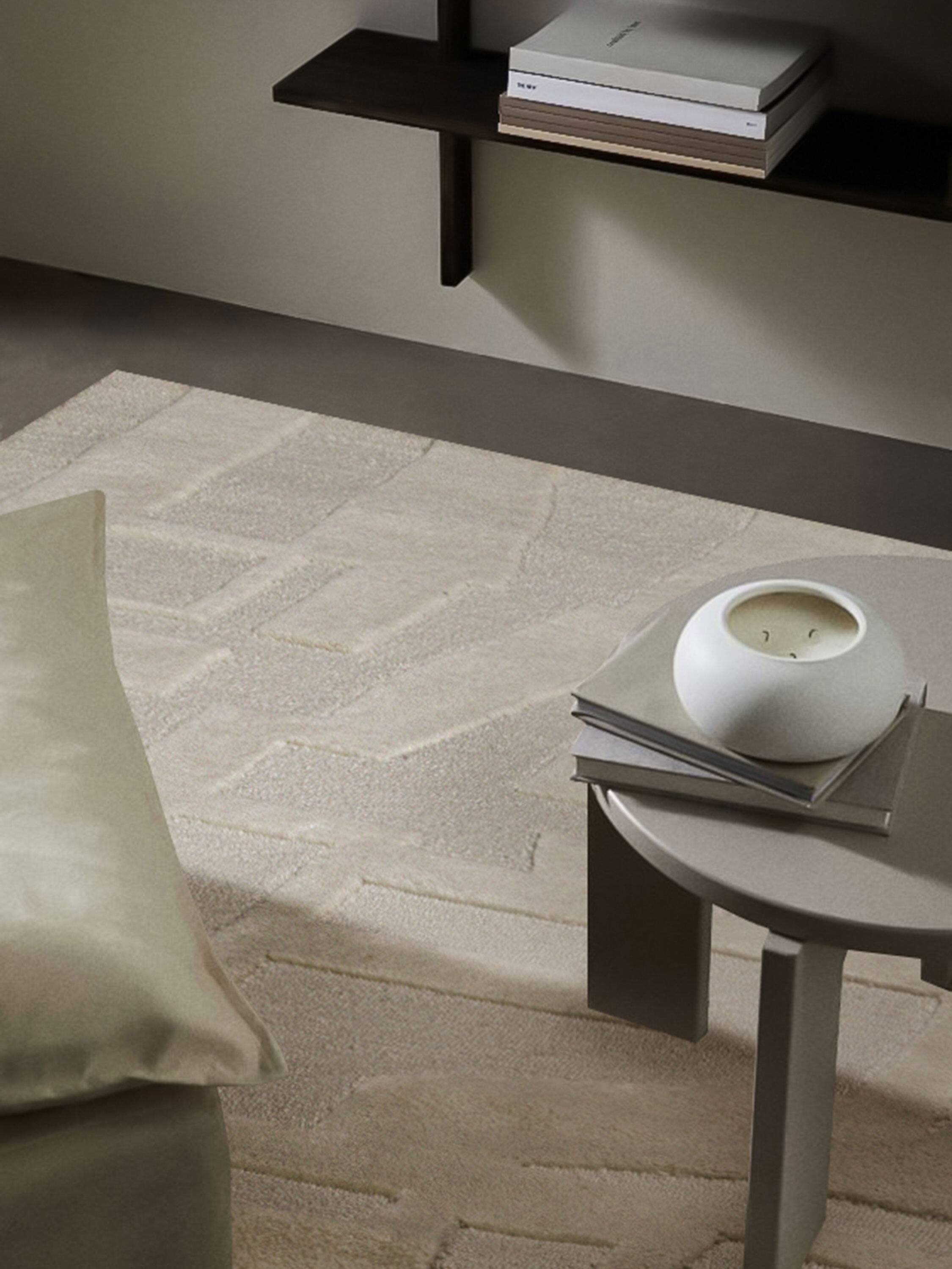 Left. GAURI KOHLI - Furano Rug - Shades of ivory.