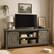Front. GARVEE - Modern Farmhouse TV Stand, 66", Sliding Barn Doors, Storage, Power & USB, TV up to 75", Dark Oak - Oak.