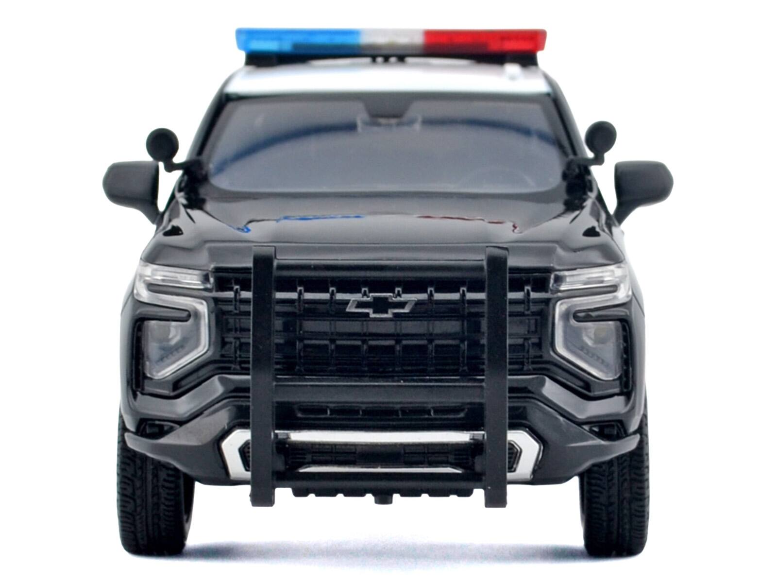 Alt View 2. Motormax - 2025 Chevrolet Tahoe PPV "CHP" Black and White with Light Bar and Lights and Sounds 1/24 Diecast Model Car by Motormax.