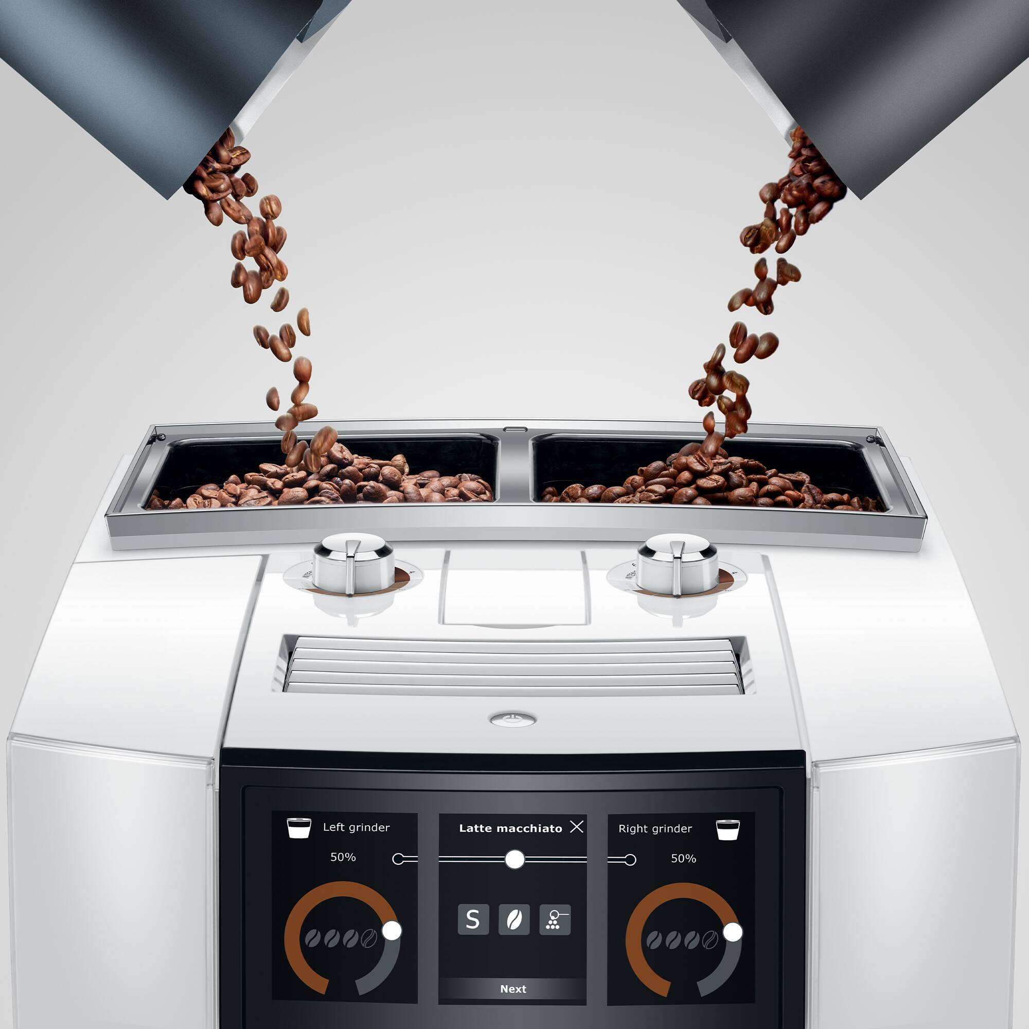 The text on the image reads: "Left grinder Latte macchiato X Right grinder 50% 50%". This text is grouped as follows:

1. "Left grinder Latte macchiato X": This sentence describes the left grinder's function, which is for preparing a latte macchiato.
2. "Right grinder 50% 50%": This sentence describes the right grinder's function, which is for preparing coffee with 50% of the coffee beans ground.