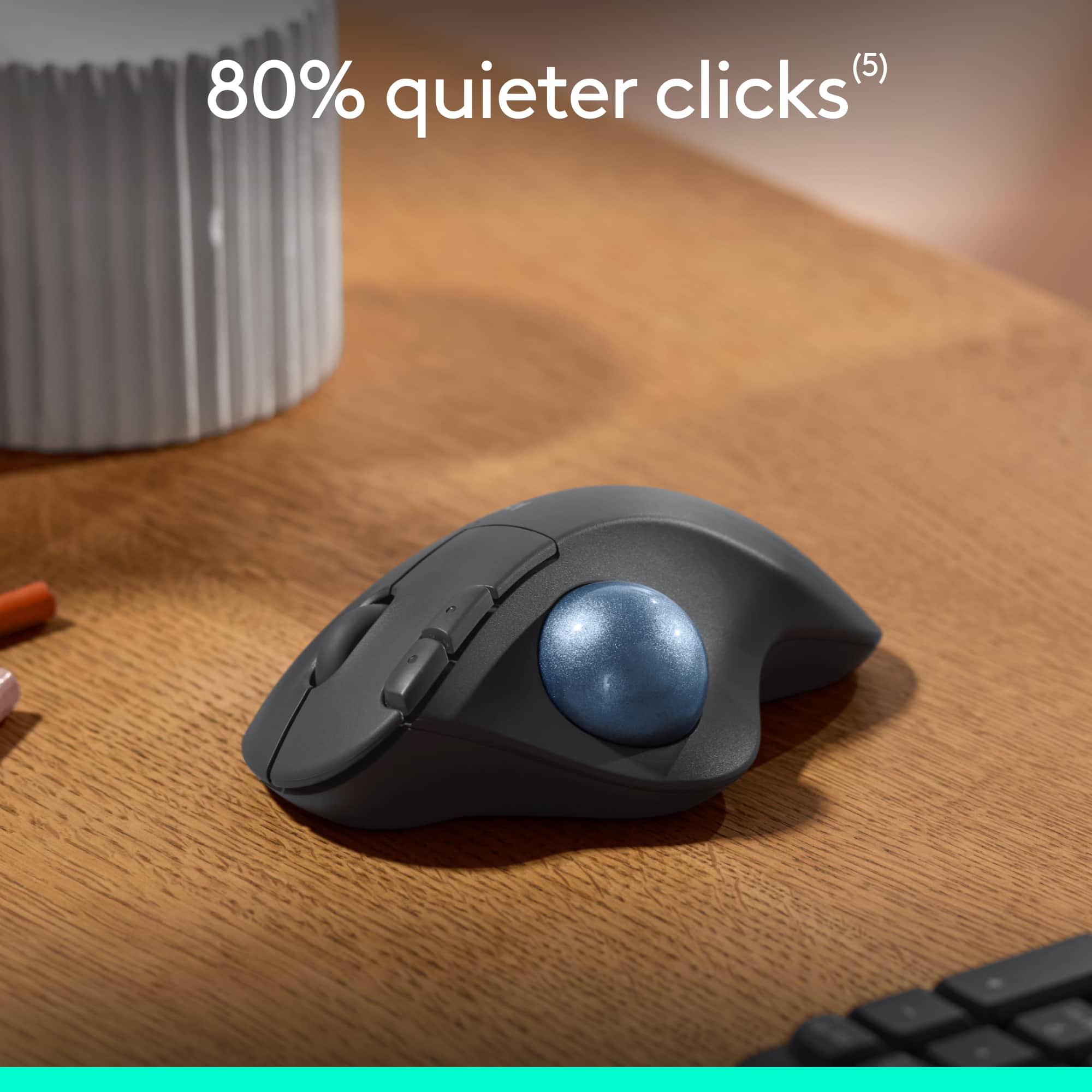 The text on the image reads "80% quieter clicks."