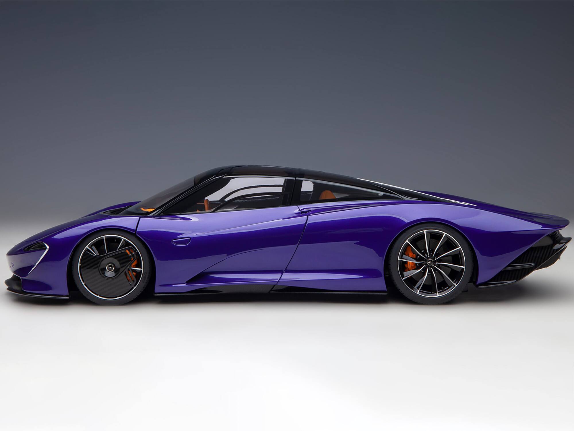 Alt View 6. Autoart - McLaren Speedtail Lantana Purple Met. w/Black Top and Yellow Interior and Suitcase Accessories 1/18 Model Car by Autoart.