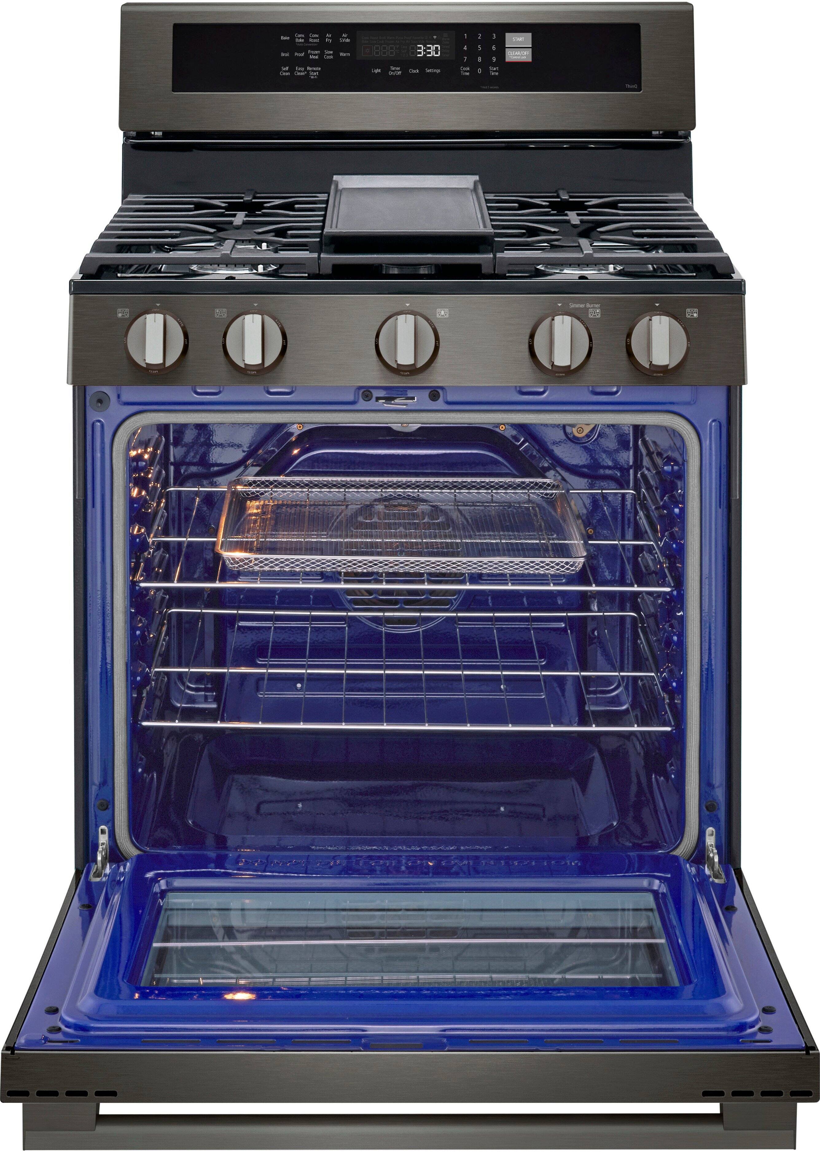 The image features a blue oven with a stove top, which is open and empty. The oven has a timer set for 3:30, and the stove top has four burners. The oven is a part of a stainless steel kitchen appliance, and it is placed next to a microwave.