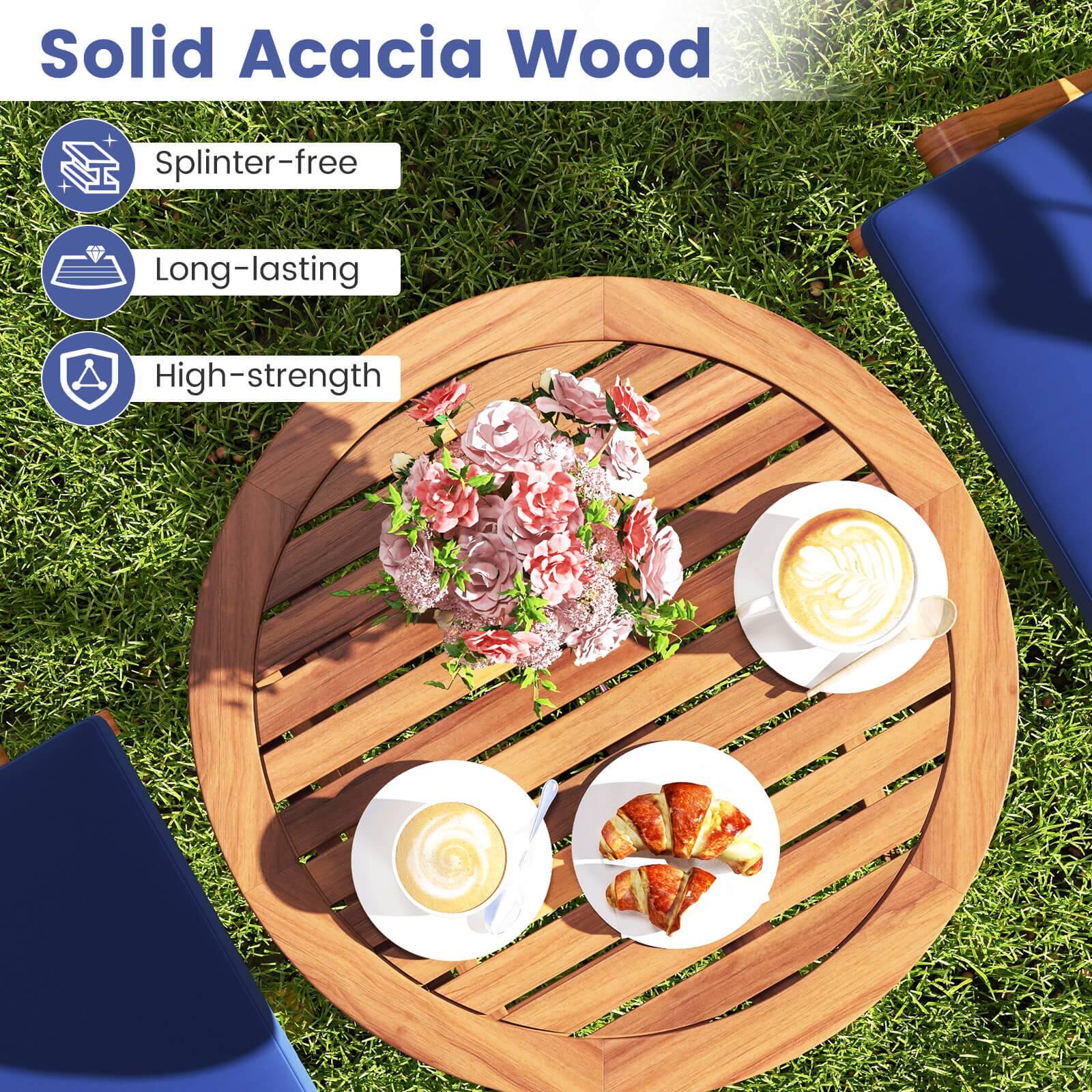 Solid Acacia Wood is a type of wood that is known for its durability, strength, and resistance to splintering. It is a popular choice for outdoor furniture, such as tables and chairs, due to its ability to withstand the elements and maintain its appearance over time. The image shows a wooden table with a vase of flowers and two cups of coffee on it, demonstrating the durability and high-strength properties of Solid Acacia Wood.