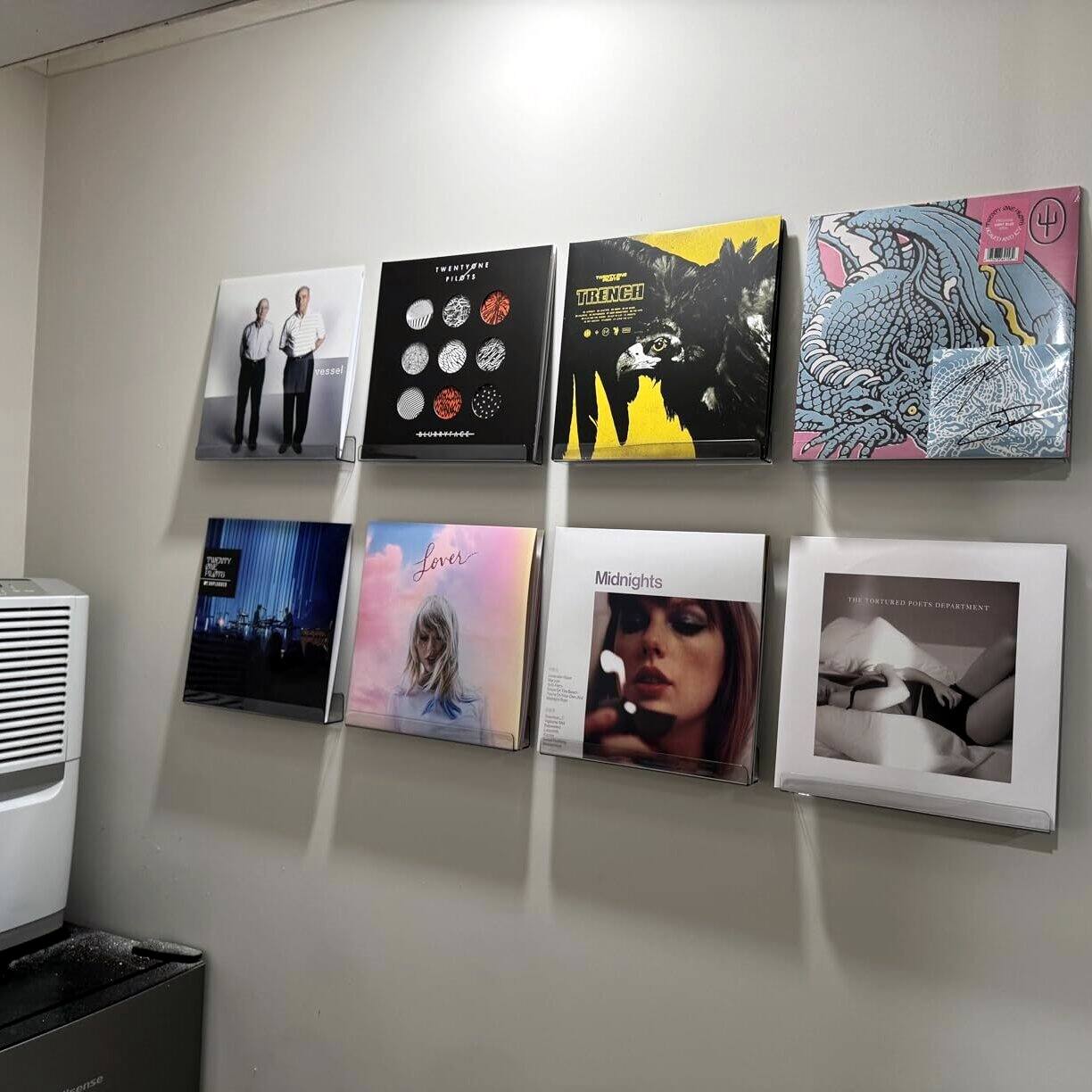 Sure, here is the corrected and grouped text from the image:

1. **Top Row:**
   - TWENTYONE PILOTS
   - PROOF
   - TRENCH
   - THE FOSTER POOL DEPARTMENT

2. **Middle Row:**
   - Lover
   - Midnights

3. **Bottom Row:**
   - (No visible text)

4. **Additional Text:**
   - 132 PIECES
   - PISTMENT