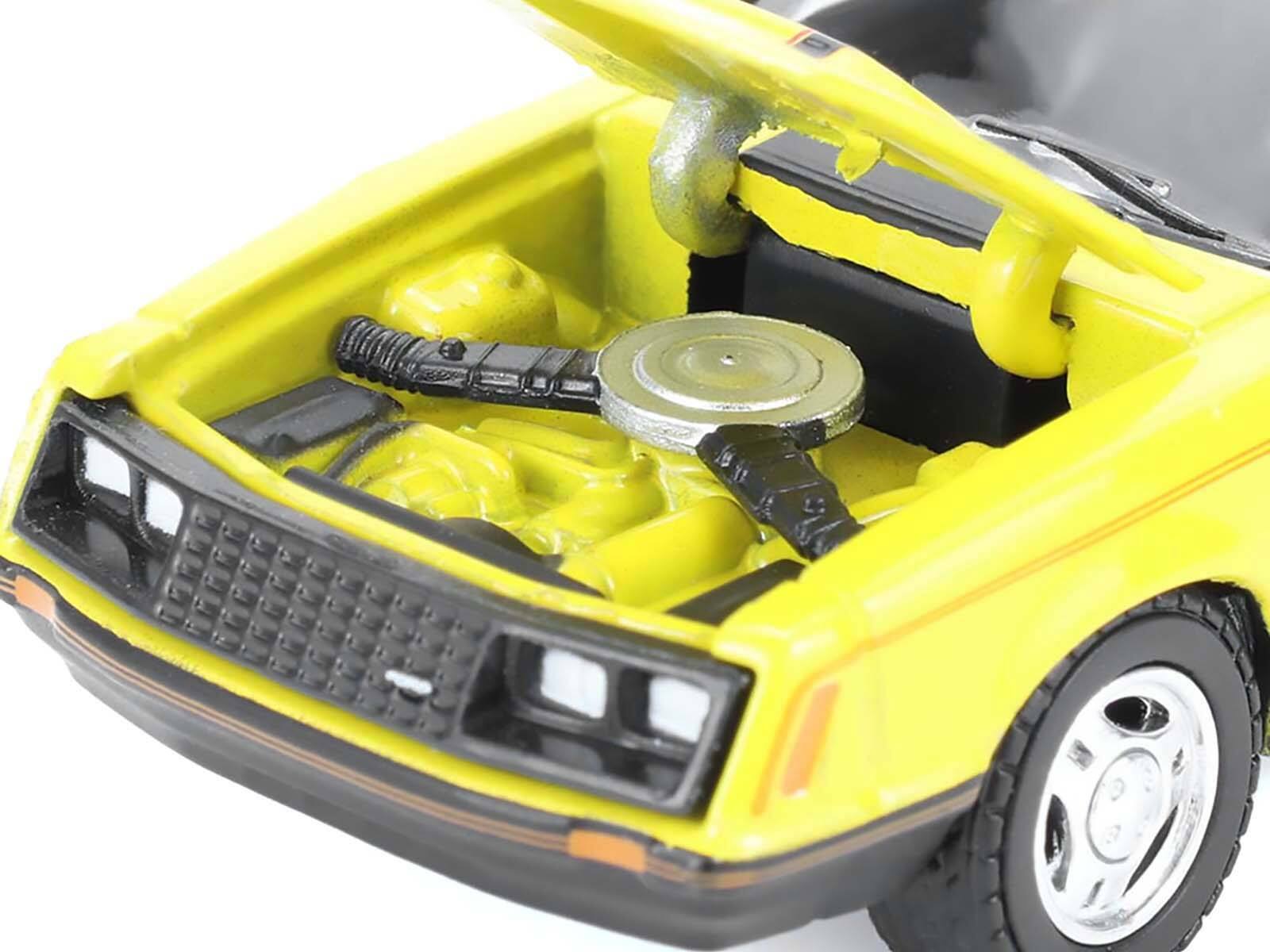 Alt View 1. Greenlight - 1979 Ford Mustang Cobra Fastback Bright Yellow w/Cobra Good Graphics "GreenLight Muscle" 1/64 Model Cars by Greenlight.