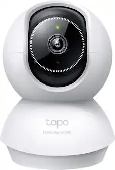 The text on the image reads "tapo Crystal Clear 2K QHD," which is a description of the camera's features. The camera is a white, round device with a black ring around the lens. It is designed to provide high-quality video and image capture, with a resolution of 2K QHD.