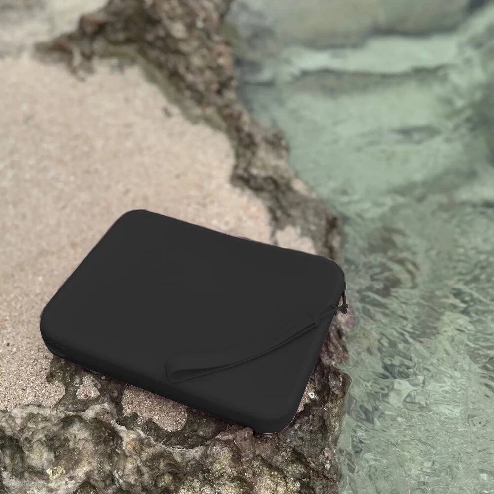 Angle. Strapsicle - Clutch for E-Readers - 6.8″–7″ Paperwhite 2024, 6″ Kindles, Kobos, Nook & iPad mini 6 - Anti-Dust Coating - Black - Black.