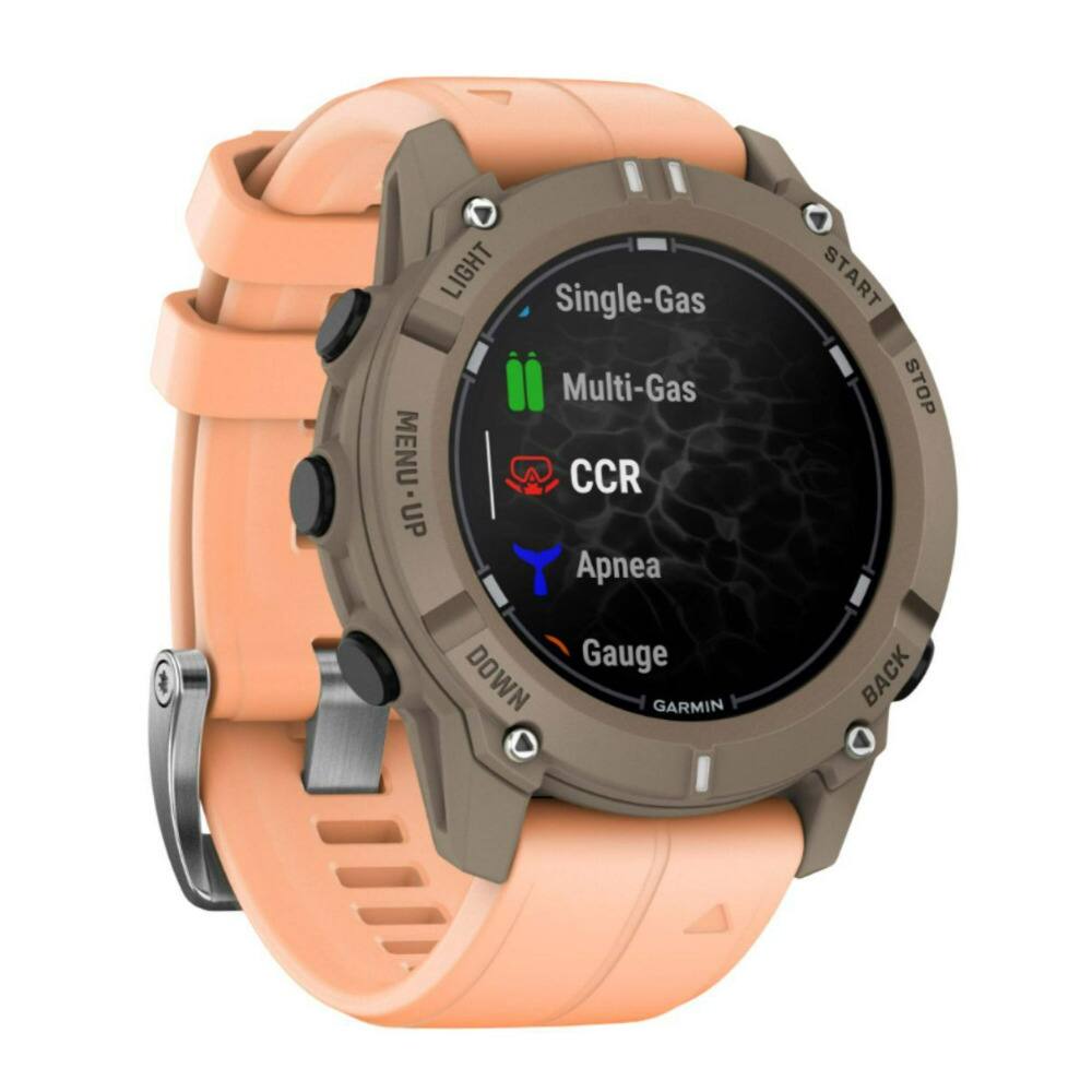 The watch is a Garmin watch and it has a single-gas multi-gas gauge. The watch face also has a menu button, which can be used to access different functions. The watch is designed to be used for diving, as indicated by the presence of the CCR button. The watch also has an apnea gauge, which can be used to measure the duration of breath-holding during diving. The watch is equipped with a light, which can be useful for visibility in low-light conditions. The watch has a pink band, making it visually distinctive.