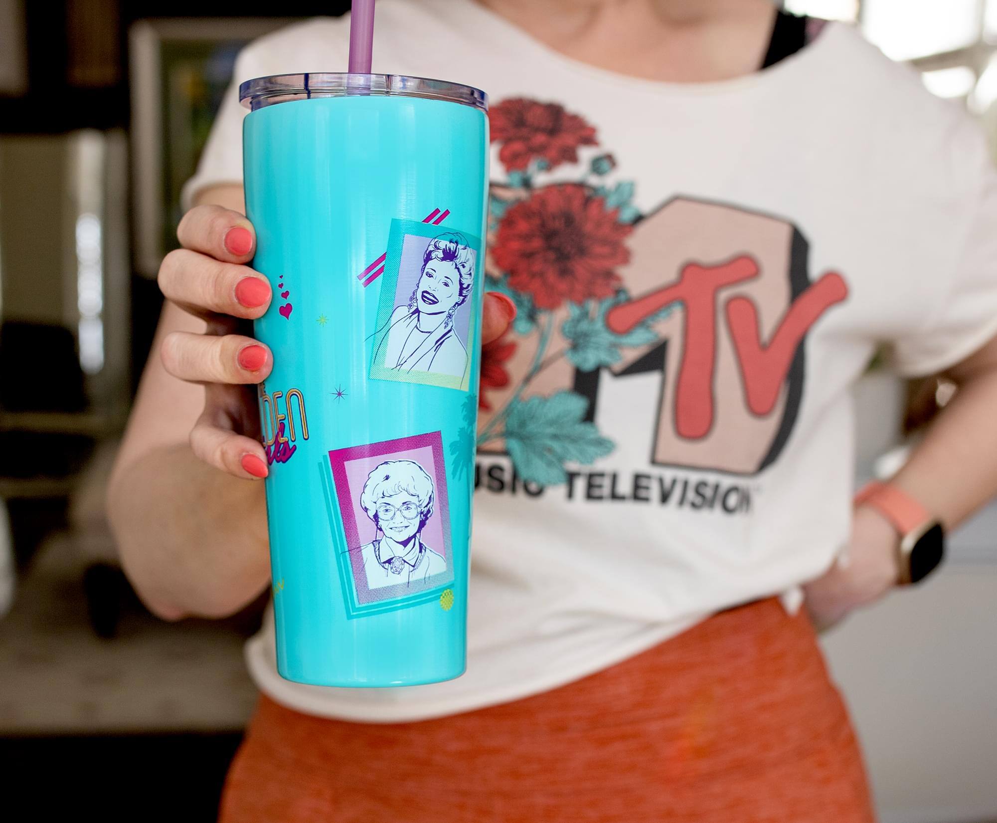 Sure, here is the corrected and grouped text from the image:

**On the Mug:**
- "IEN TV"
- "Radio Television"

**On the Shirt:**
- "Radio Television"