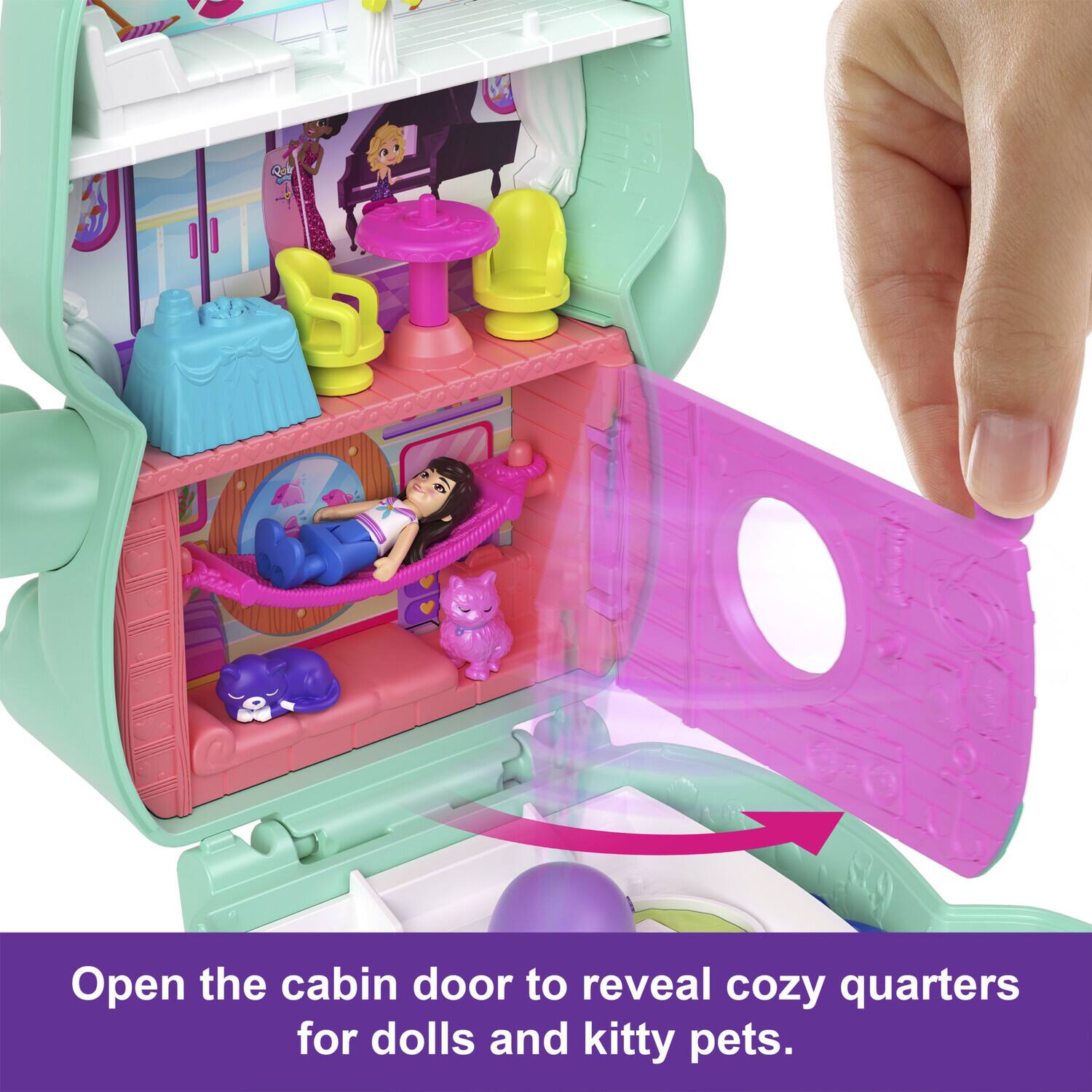 Open the cabin door to reveal cozy quarters for dolls and kitty pets.