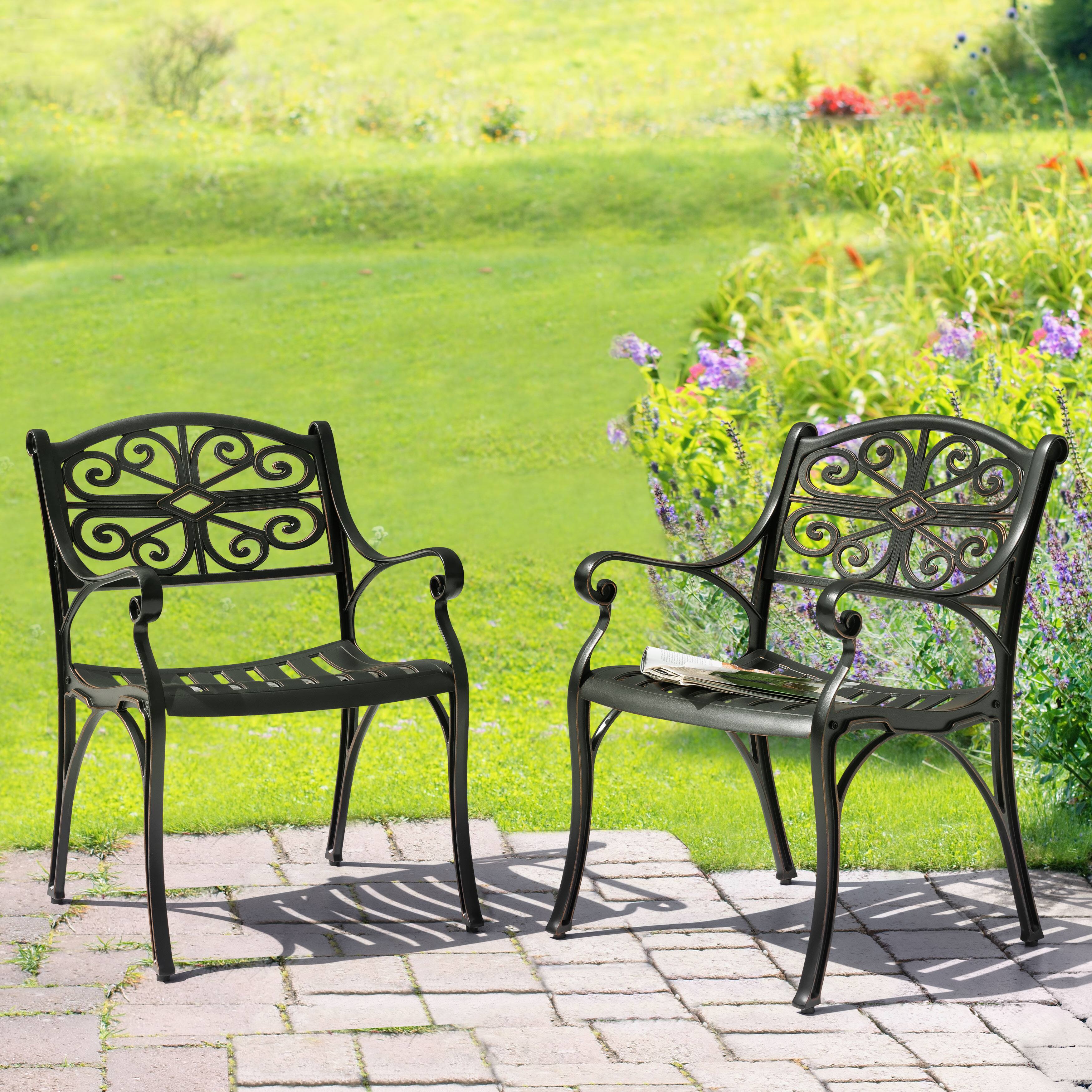 Angle. Nuu Garden - Patio Cast Aluminum Dining Chairs of 2, Bistro Chairs with Armrests - Black with Gold-Painted Edges.