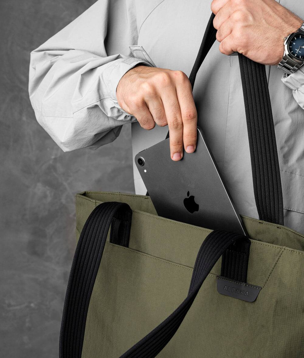 Alt View 1. ALPAKA - Flight Tote (M) Laptop Tote Bag for Work, Tote Bag Fits 14" MacBook Pro, Water Bottle Pocket, Luggage Pass-Through - Green Axoflux 400D.