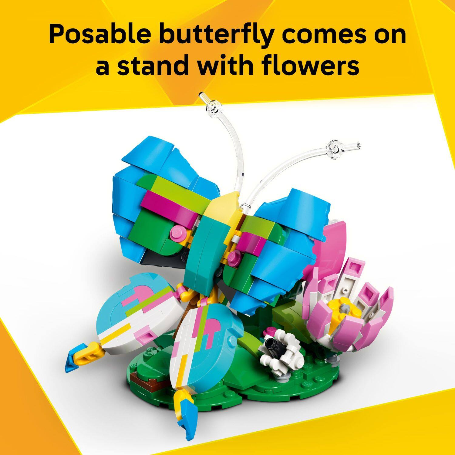 Posable butterfly comes on a stand with flowers