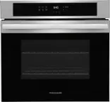 Frigidaire oven with a digital clock on the front.