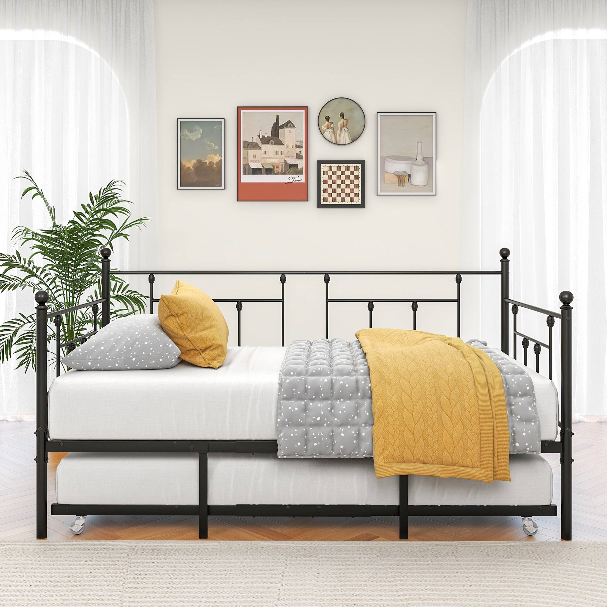 Angle. GOODSILO - Twin Size Metal Daybed Frame with Adjustable Trundle Set for Guest Rooms, Bedrooms, and Living Spaces - Black.