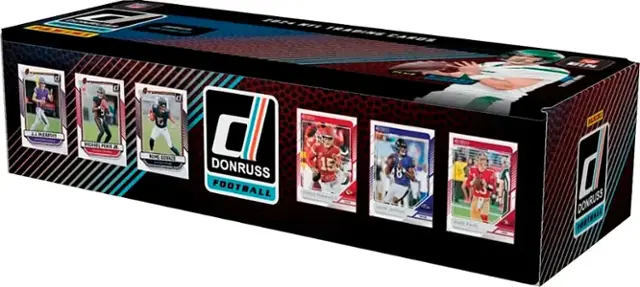 The text on the image reads: "2 WT TRABINE CASIY 0 11 MCARTIT 9 VERAL PERIE a d a BML Corka 0 DONRUSS FOOTBALL 15 8 PAKDE d DONRUSS FOOTBALL." This text is likely a description or information about the football cards in the box.