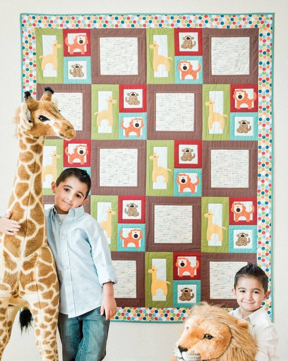 Left. AccuQuilt - Accuquilt Go This & That Fabric Cutting Dies-Zoo Animals - Black.