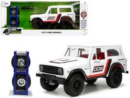 1973 Ford Bronco #008 White w/Red and Black & Red Interior w/ Extra Wheels "Just Trucks" 1/24 Diecast Model Car by Jada - Multicolor