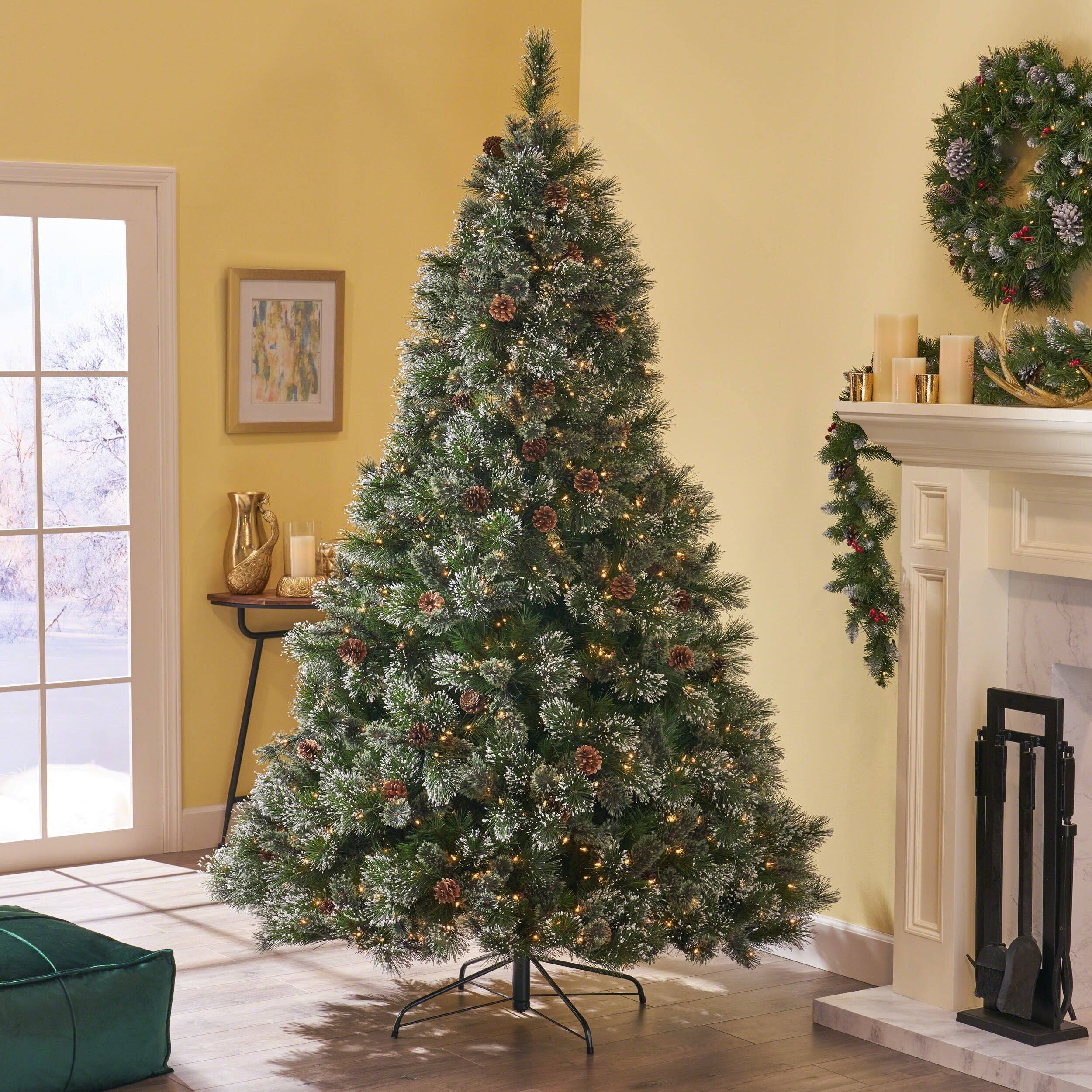 Angle. BreeBe - 9ft Cashmere and Snow Bristle Mixed Christmas Tree with Pine Cones and Clear Lights - Green.