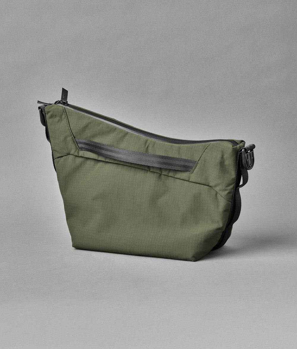 Back. ALPAKA - Flow Satchel 4L Crossbody Bag, Water Resistant Shoulder Bag, Expandable Bottle Pocket, YKK Zippers - Green Axoflux 210D.