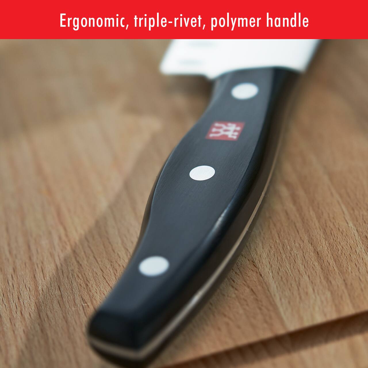 Ergonomic, triple-rivet, polymer handle