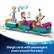 Sleigh carts with passengers zoom around the track