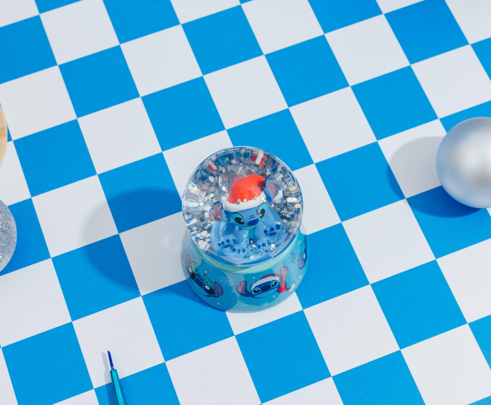 Alt View 5. Silver Buffalo - Disney Lilo & Stitch Santa Stitch 3-Inch Mini Light-Up Snow Globe - Blue.