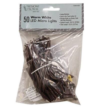 TREMONT FLORAL
ES63-922
Warm White
50 LED Micro Lights
Cool to the Touch when Lit
Durable Bulbs are Break Fade
Lighted Length: 122" (3.10m)
Total Length: 122.6" (3.71m)
CAUTION