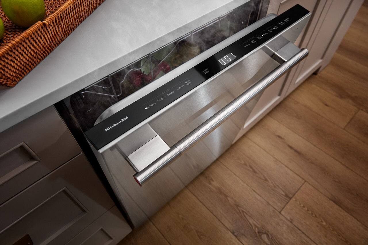 Sure, here is the corrected and grouped text from the image:

**KitchenAid**

**Cycles:**
- ProWash
- Tough
- Normal
- Express

**Rinse Only**

**124°W 240 Day**

**1:00**