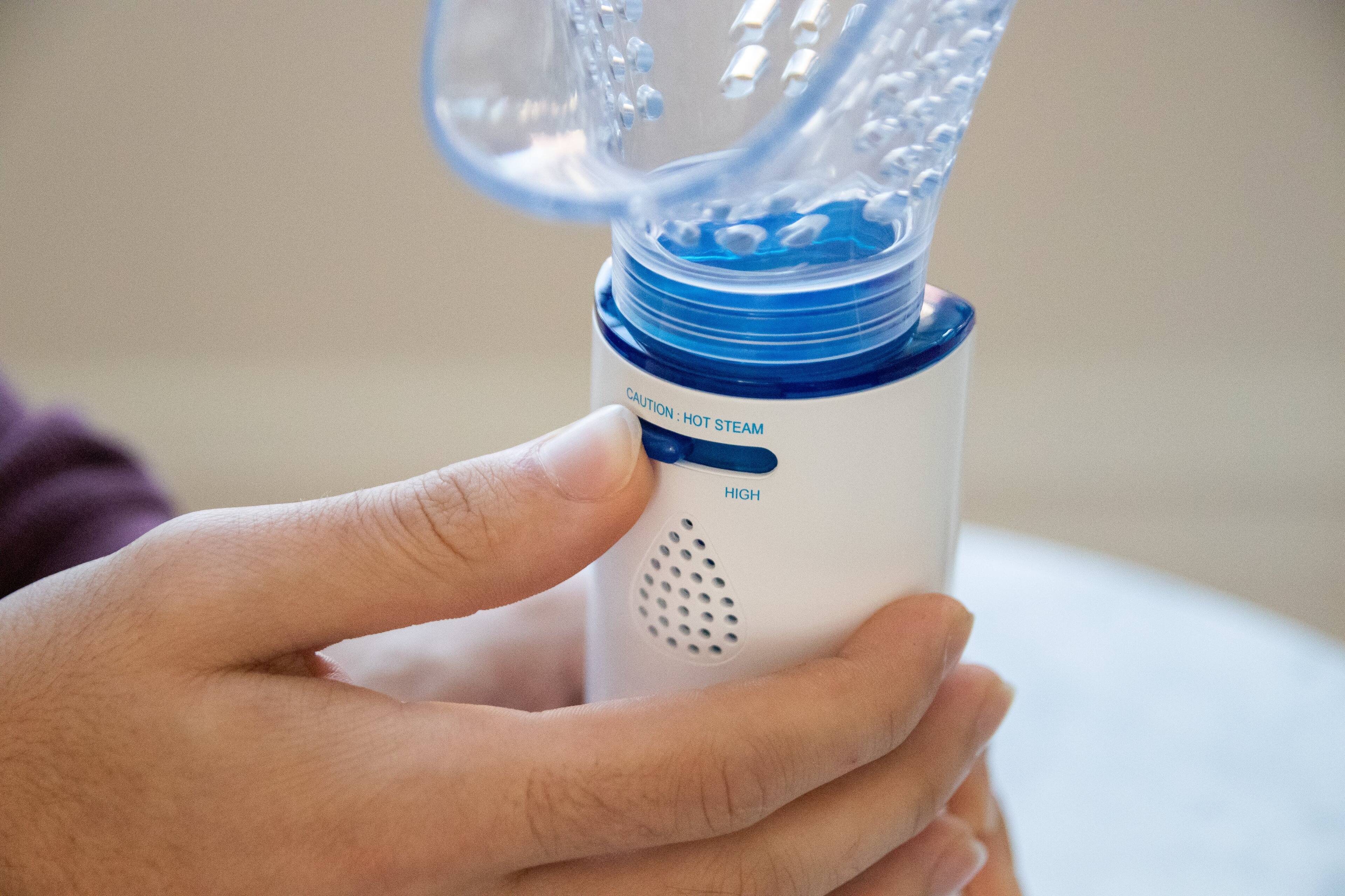 Left. CRANE - Personal Corded Steam Inhaler - White/Blue.