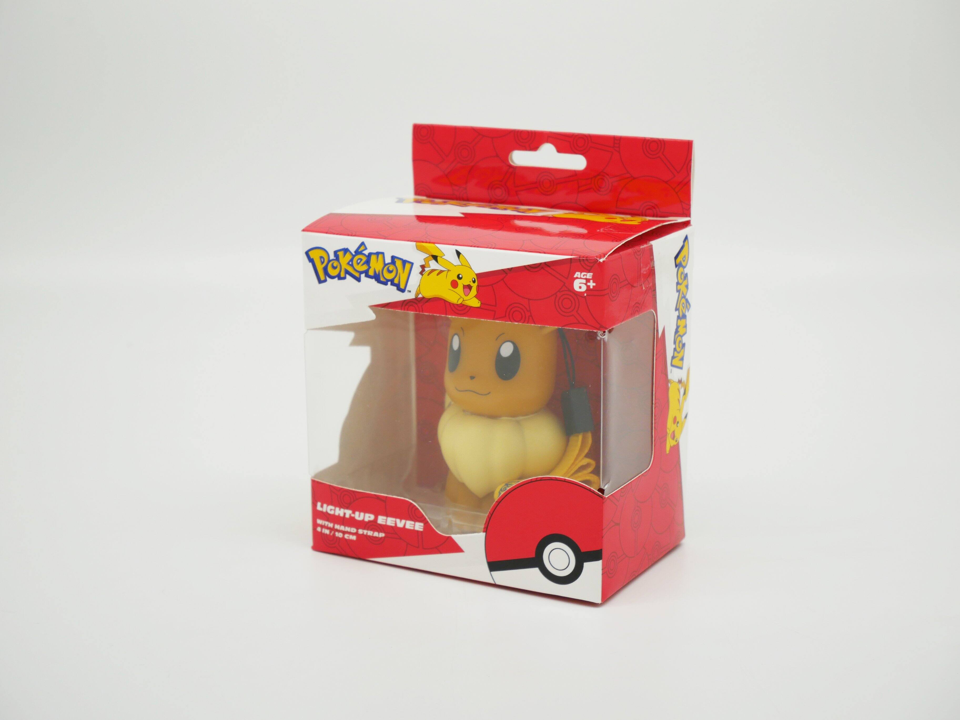 POKÉMON AGE 6+  
LIGHT-UP Eevee  
WITH HAND STRAP - CM