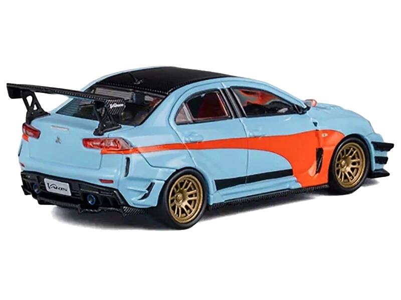 Angle. CM Models - Mitsubishi Lancer Evolution X Varis RHD (Right Hand Drive) Light Blue with Black Top and Orange Stripes 1/64 - Light Blue and Black.
