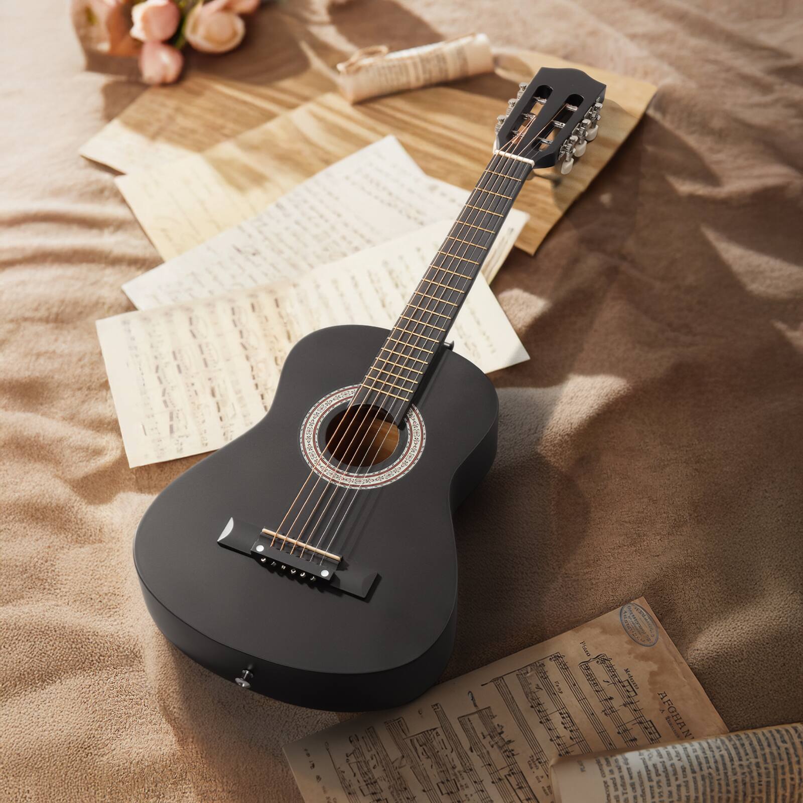 Angle. Winado - 30 Inch Beginner Acoustic Guitar, 6 String Basswood Classical Guitars Full Kit with Bag, Strap, Picks, Capo for Kids - Black.