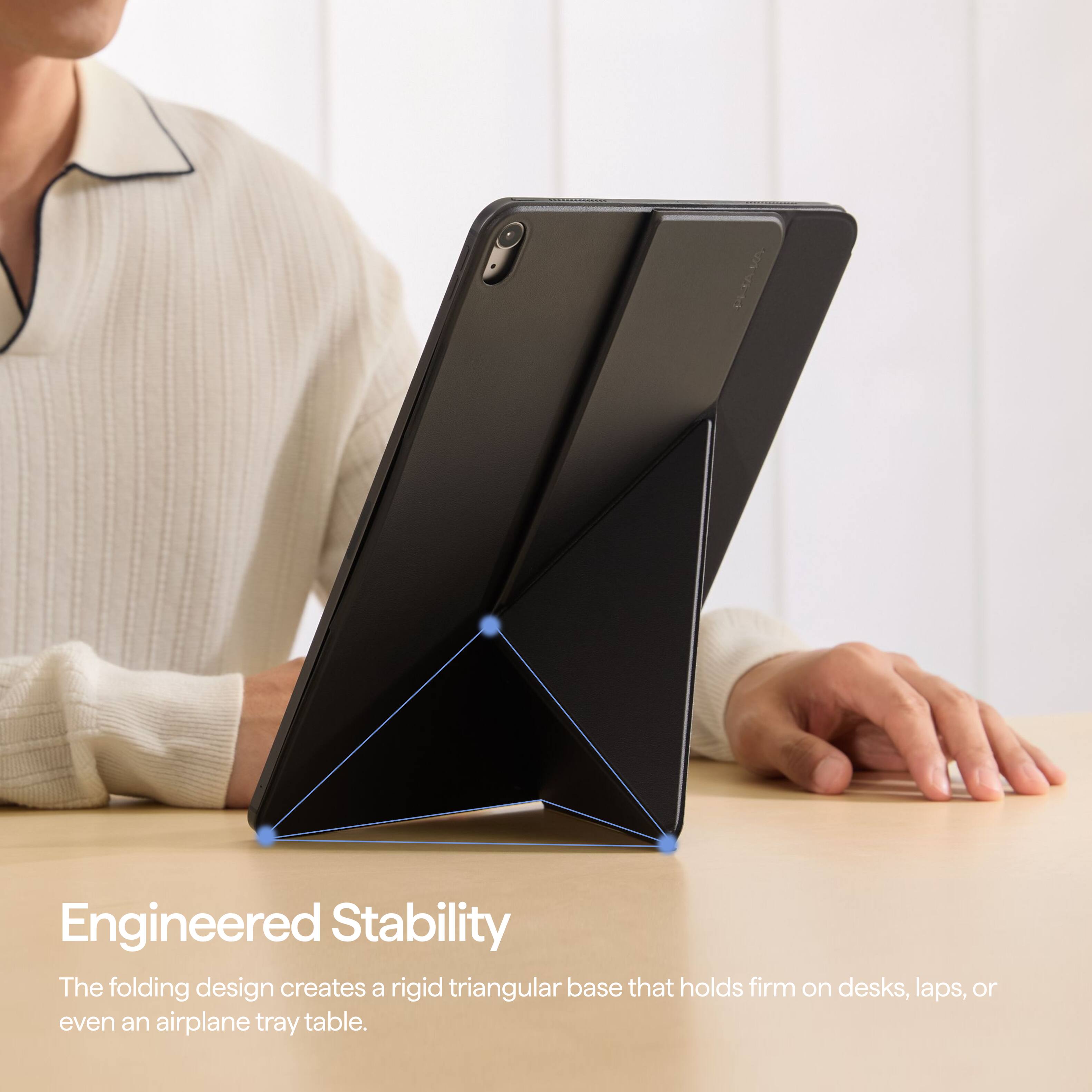 Engineered Stability  
The folding design creates a rigid triangular base that holds firm on desks, laps, or even an airplane tray table.