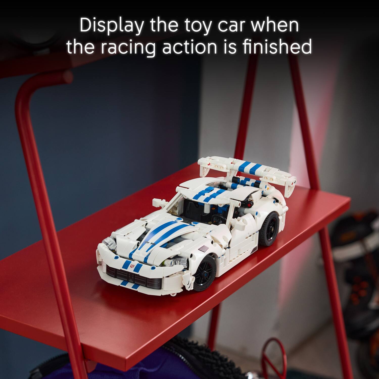 Display the toy car when the racing action is finished