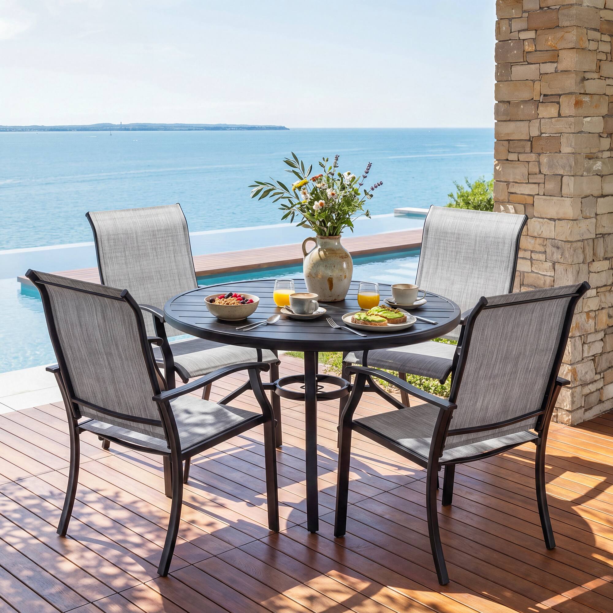 Angle. Nuu Garden - 5-Piece Patio Textilene Dining Set with Umbrella Hole, Powder Coating - Black and Gray.