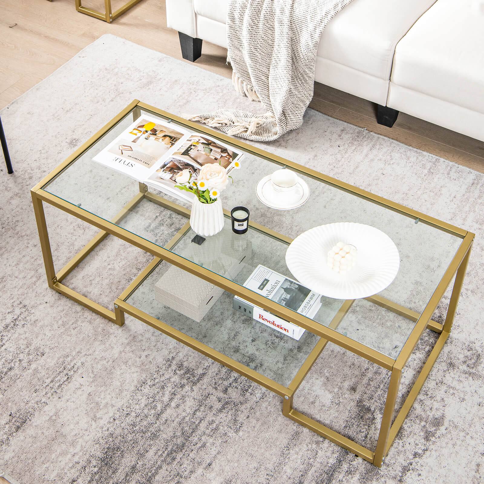 A Louis Vuitton - Revolution magazine sits on a glass coffee table.