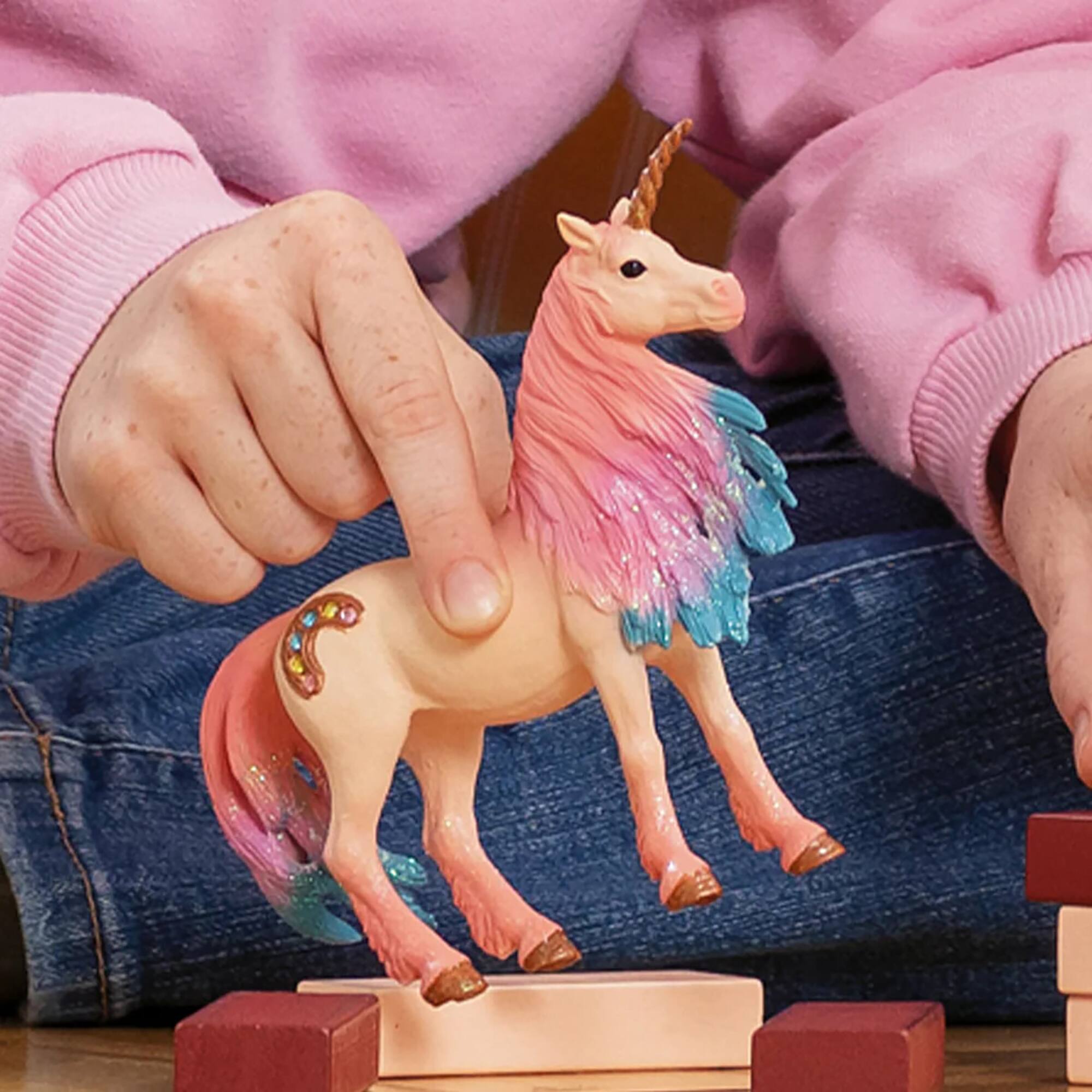 Left. Schleich - Bayala: Marshmallow Unicorn Mare.