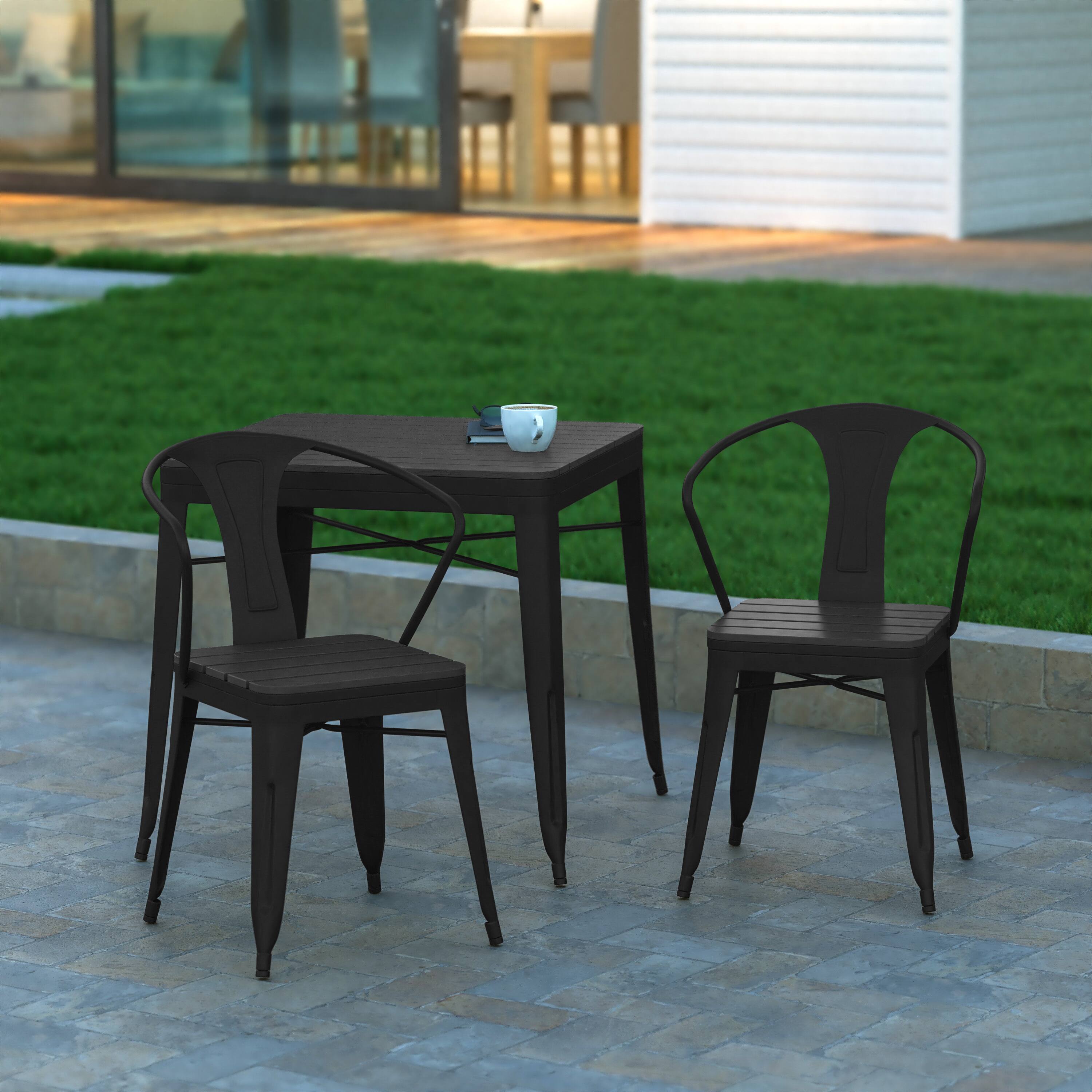 Alt View 2. Emma + Oliver - All-Weather Metal Stack Chair with Arms and Polyresin Seat and Back - Black.