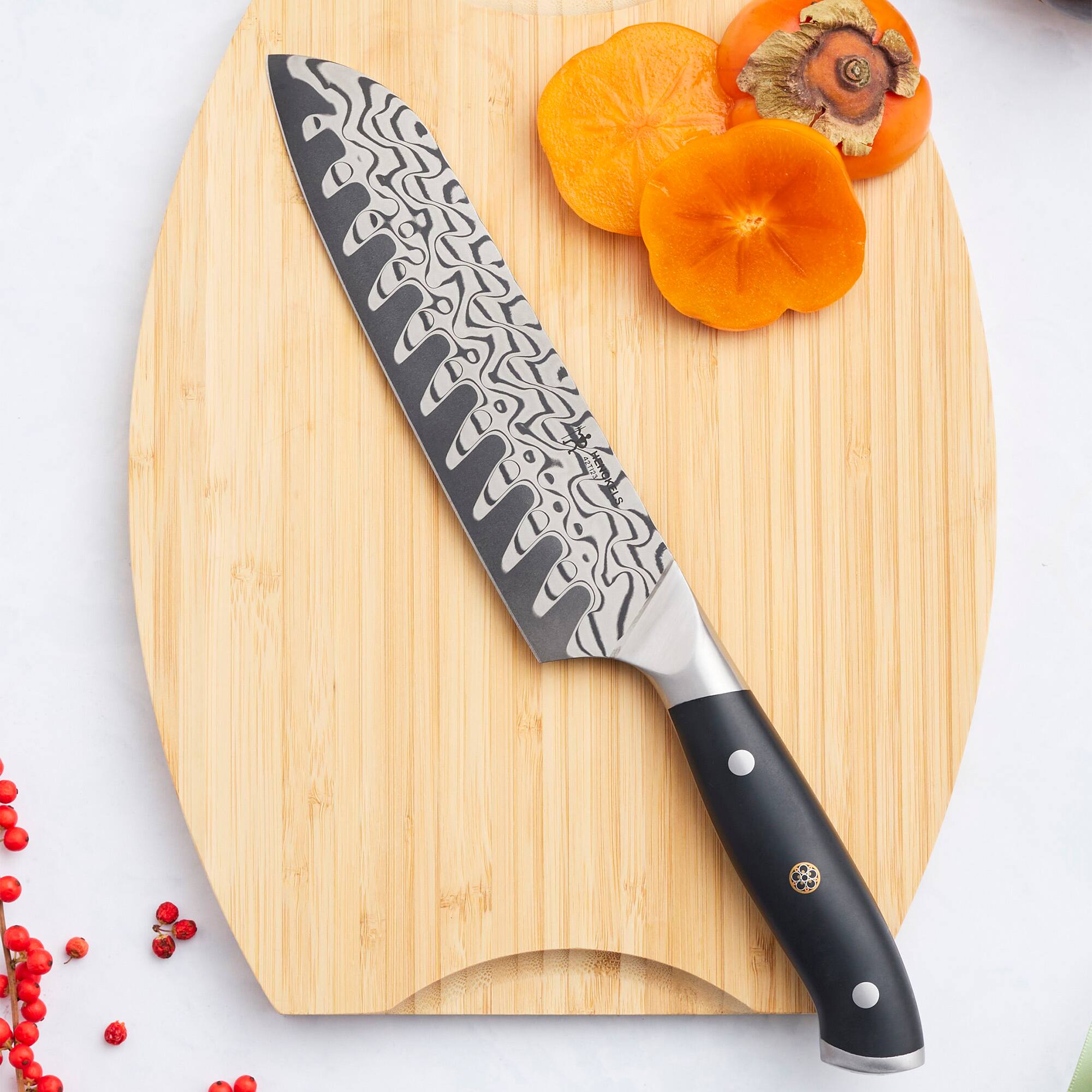 Alt View 4. Henckels - Henckels Compass Damascus 7-inch Santoku Knife - Black.