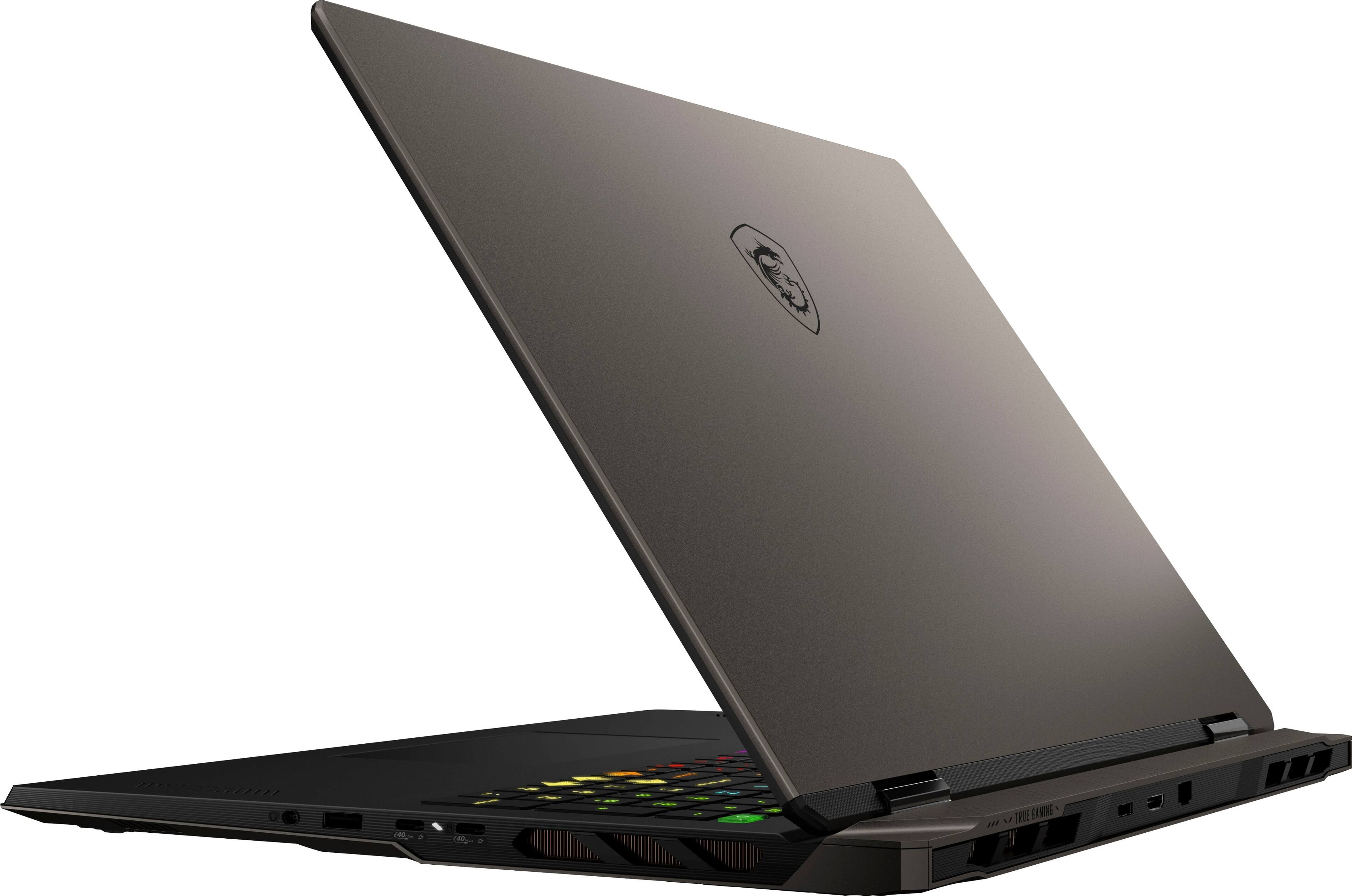 The text on the image reads "TRIE GANING 7 GANING L". This text is likely a foreign language or a code, and it does not provide any information about the laptop. The image shows a laptop computer with a keyboard and a mouse, and it is open and ready for use.