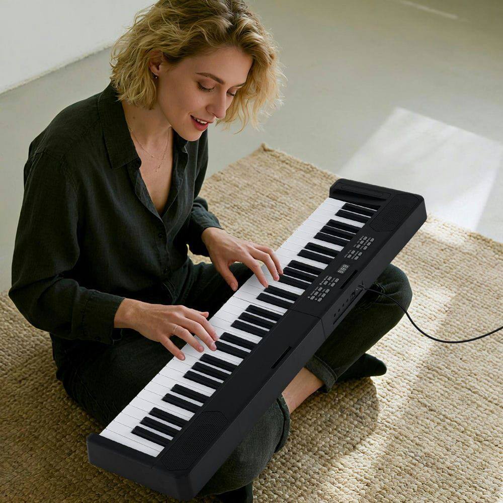 Left. Resenkos - 61-Key Foldable Full-Size Electronic Keyboard with MIDI & Split Function - Black.