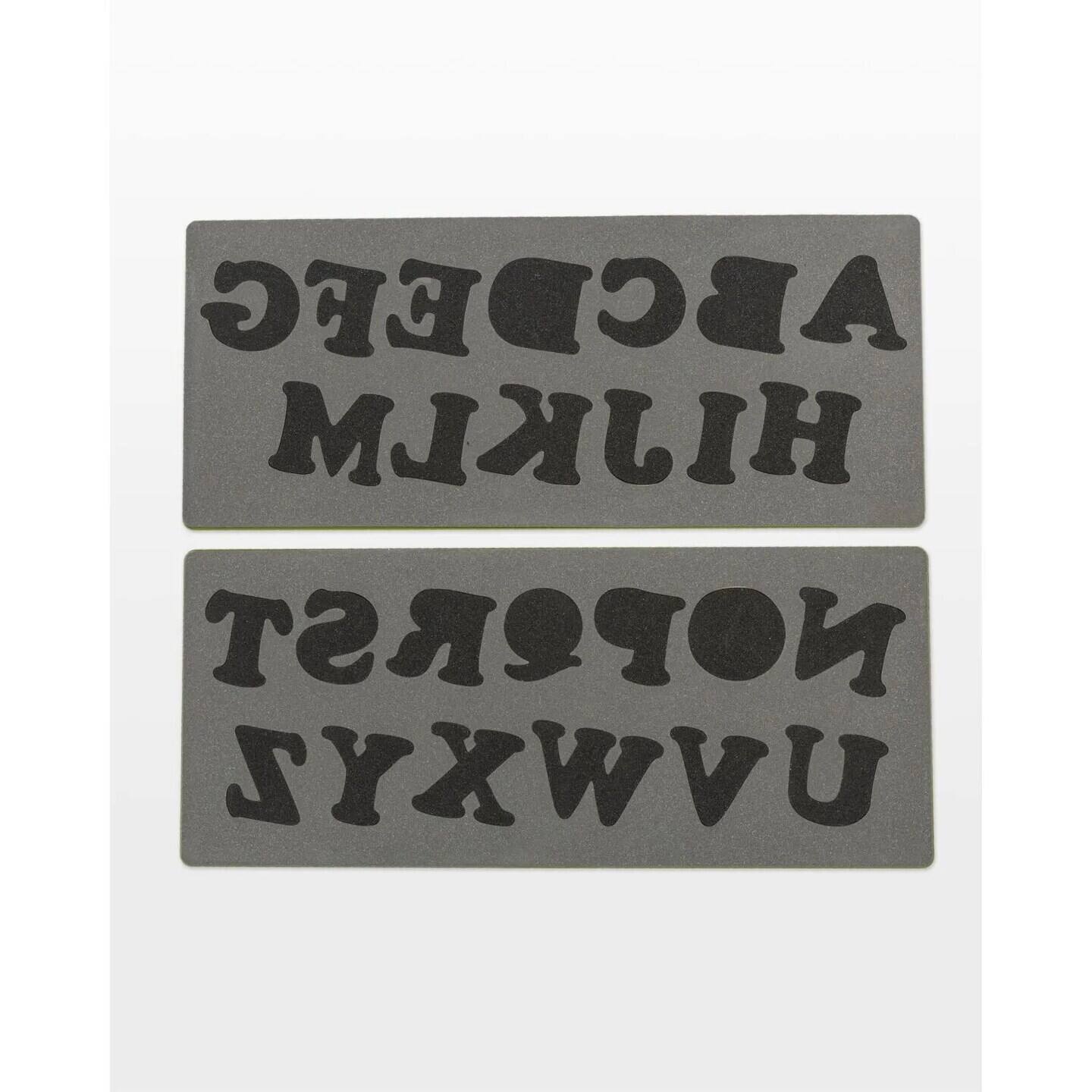 The text on the image is "HIJKLMN OPQRST UVWXYZ".