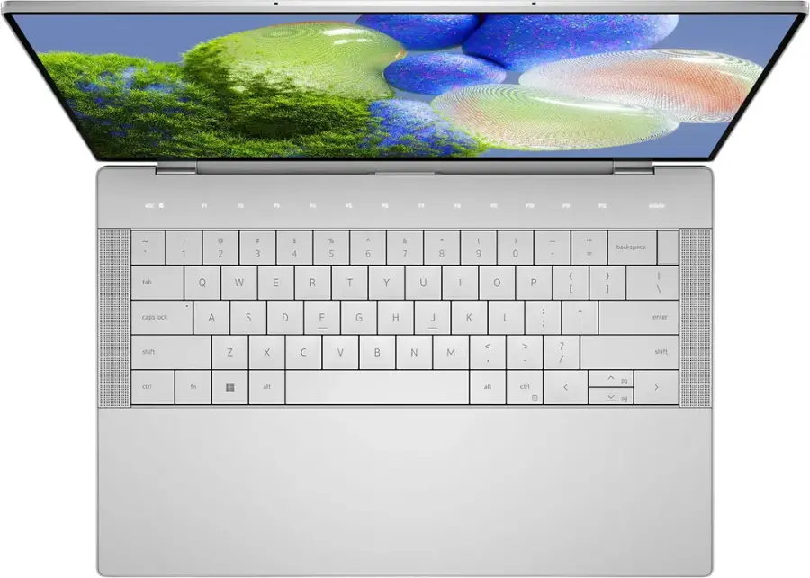 The image shows a laptop with a keyboard that has a few keys missing. The missing keys include the letters "A", "S", "D", "F", "G", "H", "J", "K", "L", and the numbers "1", "2", "3", "4", "5", "6", "7", "8", "9", and "0". The remaining keys include the letters "Q", "W", "E", "R", "T", "Y", "U", "I", "O", "P", "J", "K", "L", and the numbers "." and "=". The keyboard also includes the function keys, arrow keys, and a few other special keys.