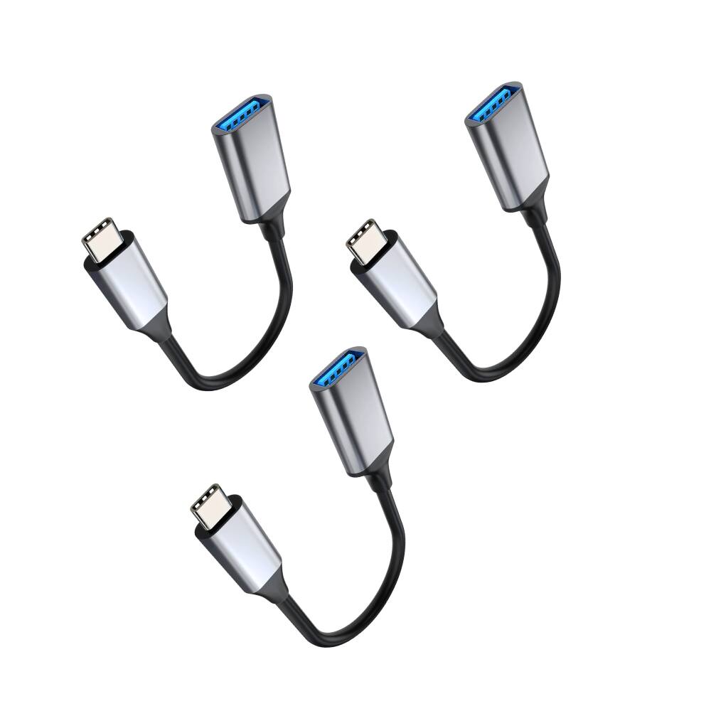 The image shows four USB-C to USB-A adapters.