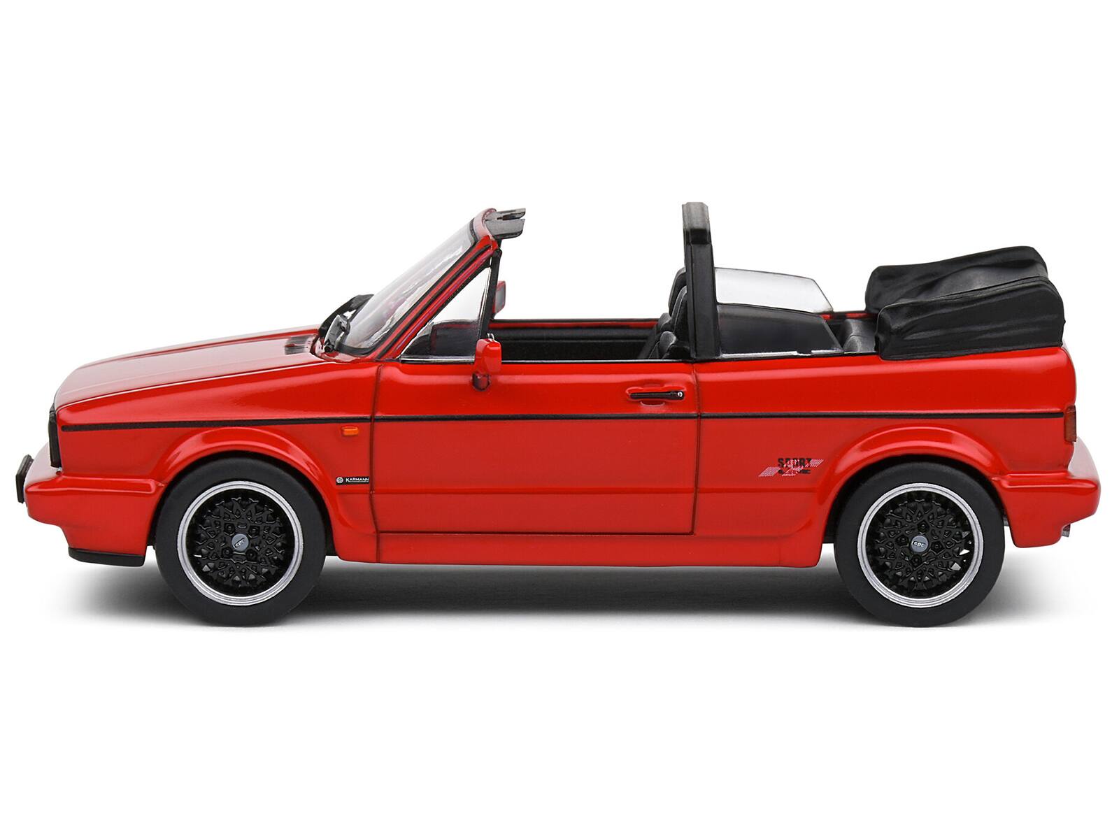 Angle. Solido - 1992 Volkswagen Golf 1 Cabriolet Sportline Tornado Red 1/43 Diecast Model Car by Solido - Red.