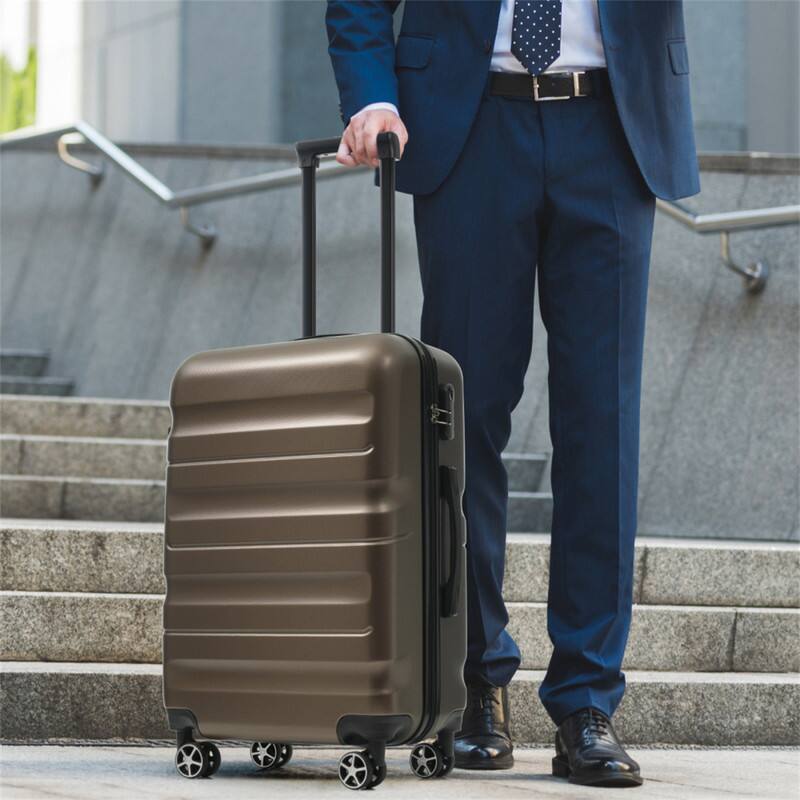Angle. HTUTWOO - 6-Piece ABS Hardshell Luggage Set - Lightweight & Durable Suitcases,Dual Spinner Wheels,Carry-On & Check-In Sizes,Travel - Brown.