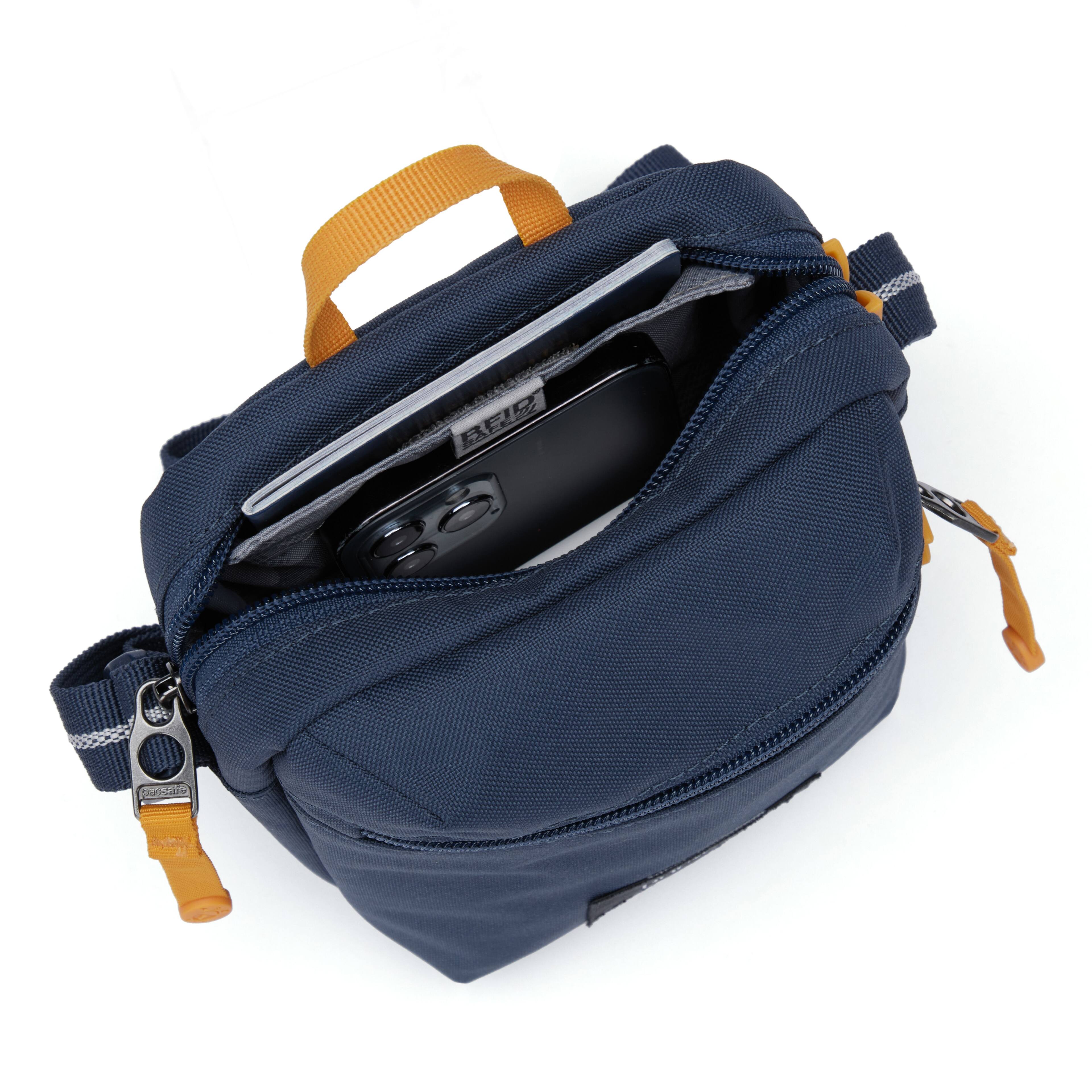 Back. Pacsafe - GO Micro Crossbody (Coastal Blue) - Coastal Blue.